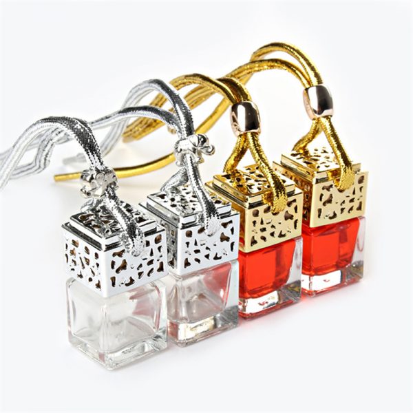 Car perfume bottle with hollow cap - Image 1